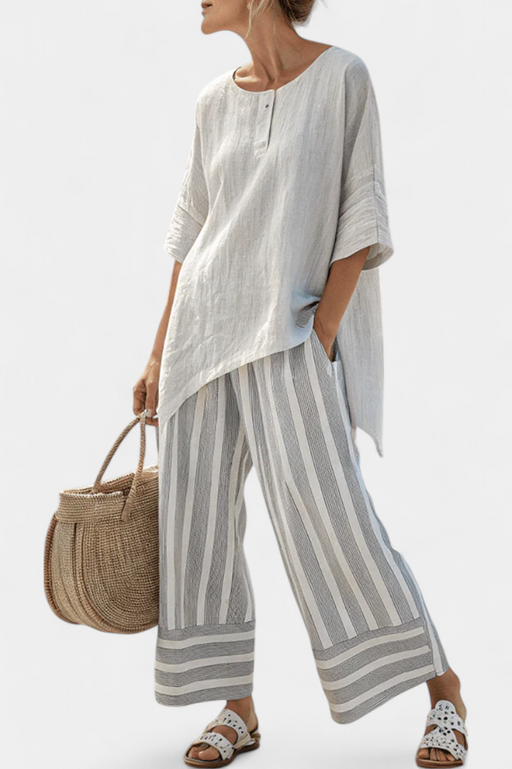 Talvora | Chic Asymmetrical Blouse with Striped Trousers